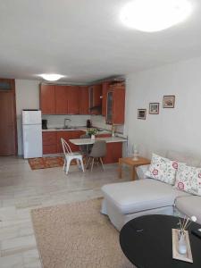 Kuchyň nebo kuchyňský kout v ubytování Ermionis home