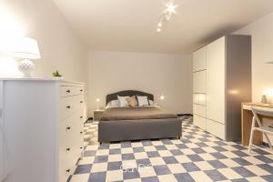 Ένα ή περισσότερα κρεβάτια σε δωμάτιο στο Sant'Angelo il paese delle fiabe - L'angolo di D'Artagnan