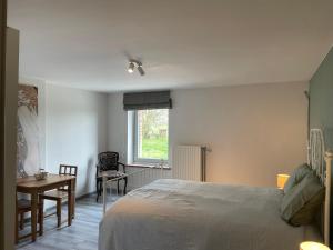 Postel nebo postele na pokoji v ubytování Eole - Fermette typique Ardennaise