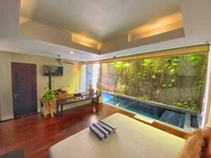 Bazén v ubytování Venus- 1br pvt pool villa in kuta By iLys Collection nebo v jeho okolí