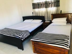 Postel nebo postele na pokoji v ubytování 97 Ella