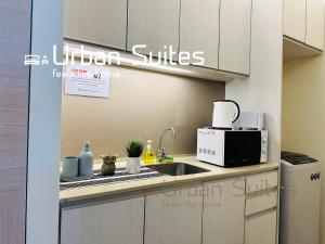 Kuchyň nebo kuchyňský kout v ubytování Urban Suites @ Swiss Garden Residence