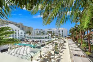 a view of the resort from the pool at Princess Inspire Tenerife - Adults Only in Adeje +58 photos