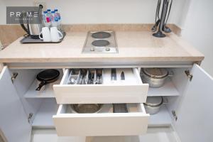 Kjøkken eller kjøkkenkrok på Prime Residence New Alamein