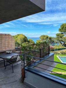 a balcony with a view of the ocean at BONAVISTA PLATJA BEGUR in Begur