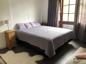 Voodi või voodid majutusasutuse Appartement dans une maison de charme. toas