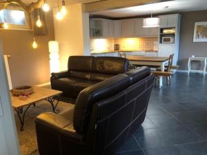Istumisnurk majutusasutuses Appartement dans une maison de charme.