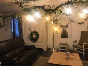 Istumisnurk majutusasutuses Appartement dans une maison de charme.