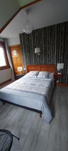 Ένα ή περισσότερα κρεβάτια σε δωμάτιο στο Chambre au Moulin des Templiers