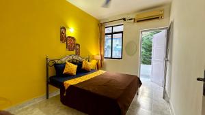 Letto o letti in una camera di Muffys Pool Apartment