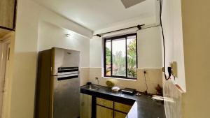 Cucina o angolo cottura di Muffys Pool Apartment