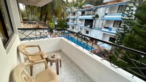 Balkón nebo terasa v ubytování Muffys Pool Apartment