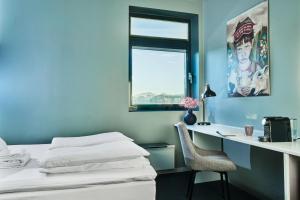Postel nebo postele na pokoji v ubytování Smarthotel Forus