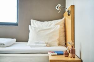 Postel nebo postele na pokoji v ubytování Smarthotel Forus