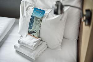 Postel nebo postele na pokoji v ubytování Smarthotel Forus