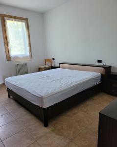 Postel nebo postele na pokoji v ubytování Casa dei Prati