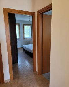 Postel nebo postele na pokoji v ubytování Casa dei Prati
