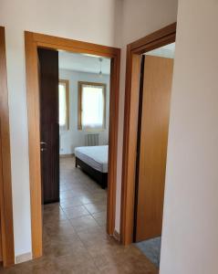 Postel nebo postele na pokoji v ubytování Casa dei Prati