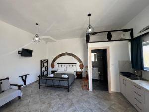 TV a/nebo společenská místnost v ubytování Xanthi Apartments