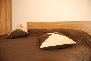 Ένα ή περισσότερα κρεβάτια σε δωμάτιο στο Едноспален апартамент Pirin Palace