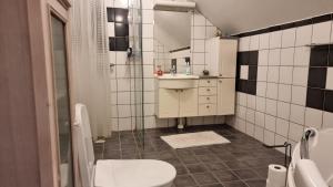 Koupelna v ubytování Guest House Tidaholm + 4 fotografie