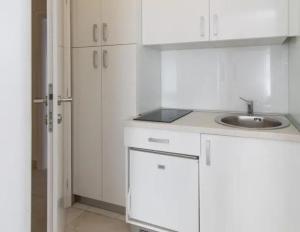 Kuchyň nebo kuchyňský kout v ubytování Rooms & Apartment Mama Mia