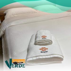 Postel nebo postele na pokoji v ubytování Because Verde Resort