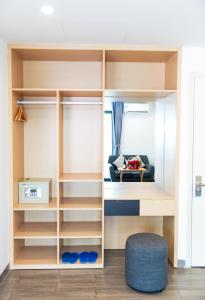 a room with a bunk bed with a couch at Warm Ways Hotel & Serviced Apartments in Ho Chi Minh City +69 photos