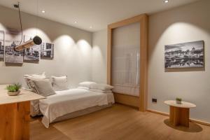a bedroom with a bed and a window at Ripetta Luxury Apartments in Rome