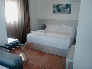 Postel nebo postele na pokoji v ubytování Q Resort
