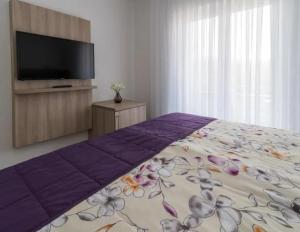 Postel nebo postele na pokoji v ubytování Rooms & Apartment Mama Mia