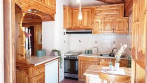 Kuchyň nebo kuchyňský kout v ubytování Quick Home - Viola