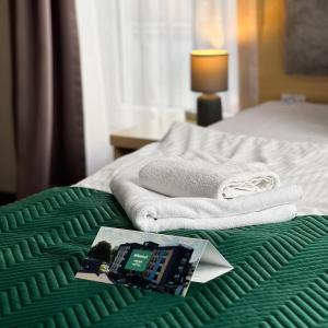 Postel nebo postele na pokoji v ubytování Seven Hotel Bytom - Katowice