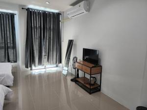 TV a/nebo společenská místnost v ubytování LD Guest House + 5 fotografií