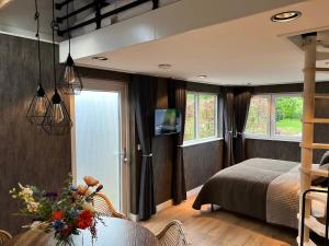 Postel nebo postele na pokoji v ubytování Bed and Breakfast Roodkapje