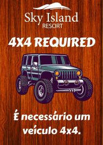 a poster of a jeep on a wooden wall at Sky Island Resort in Ponta Malongane
