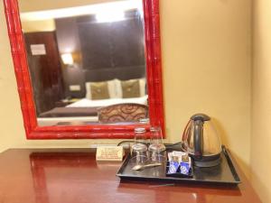 Postel nebo postele na pokoji v ubytování Astoria Hotel