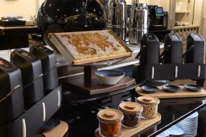 a counter with a tray at Hilton Prague Old Town in Prague