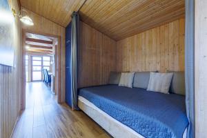 Kama o mga kama sa kuwarto sa Cabin Úthlíð - Birta Rentals