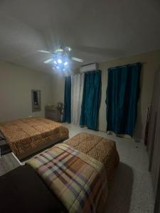 Postel nebo postele na pokoji v ubytování Chaltan Apartments