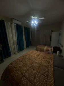 Postel nebo postele na pokoji v ubytování Chaltan Apartments