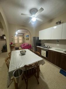 Kuchyň nebo kuchyňský kout v ubytování Chaltan Apartments + 7 fotografií