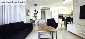 Televiisor ja/või meelelahutuskeskus majutusasutuses sea view & pool eilat