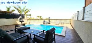 The swimming pool at or close to sea view & pool eilat