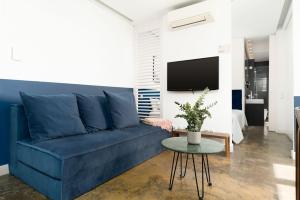 TV a/nebo společenská místnost v ubytování Limehome Lisbon Calçada do Cardeal