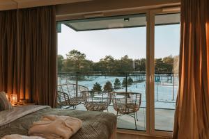 Balkón nebo terasa v ubytování Nadmorska Apartments ApartView in Łeba by Rent like home