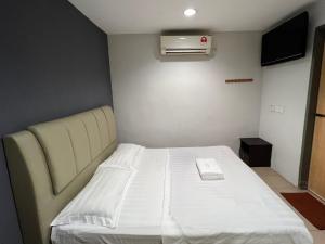 北干经济型酒店 客房内的一张或多张床位