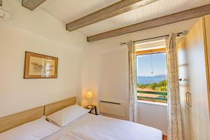 Posteľ alebo postele v izbe v ubytovaní Holiday home Mely