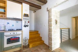 Kuchyňa alebo kuchynka v ubytovaní Holiday home Mely