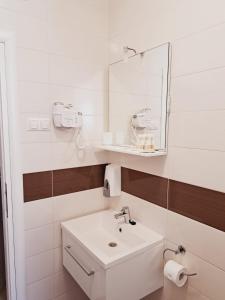 Koupelna v ubytování Rooms & Apartment Mama Mia